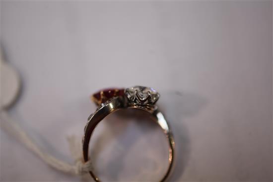 A gold, ruby and diamond crossover ring, size M.